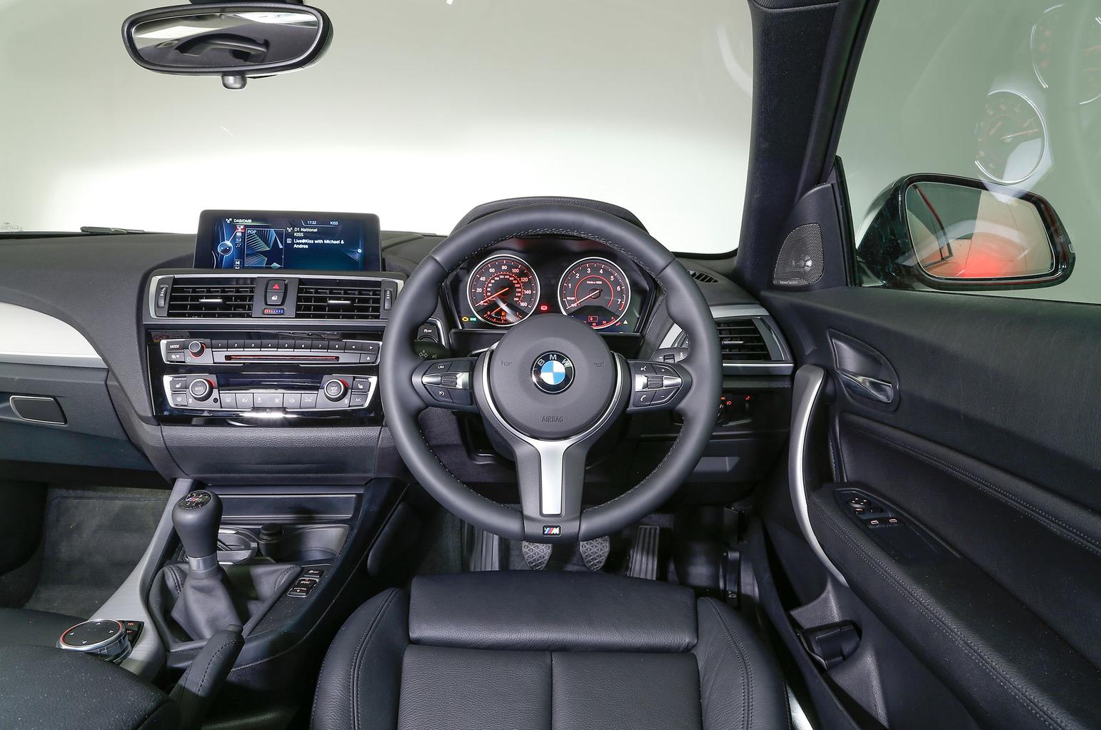 Ford Focus RS vs BMW M135i Ford Focus RS vs BMW M135i